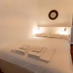 Апартаменты Giardino E Piscina